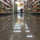 Down an aisle view, grocery store with polished floors