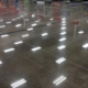 Front view of polished concrete floor in supermarket retail store