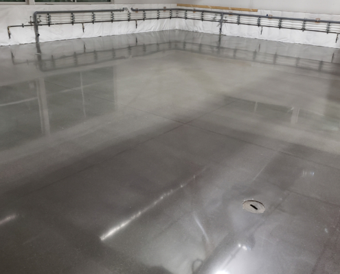 Front view of grey polished concrete floors